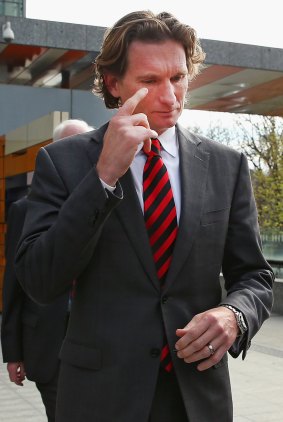 Hit for six: James Hird leaves the Federal Court in Melbourne on Friday.