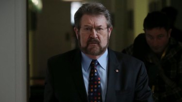 Senator Derryn Hinch uses parliamentary privilege to name 'monster' cop who raped children over 16 years.