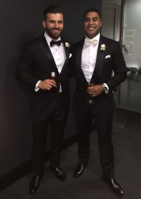 Brothers in arms: Josh Mansour and Michael Jennings at Jennings' wedding.
