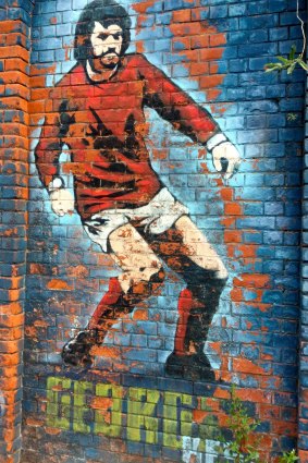 A mural of Best in Belfast.