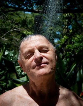 Tony Olejnicki cooling down with a shower in New Farm.