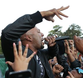 Crowd-pleaser: Rapper Common takes it to the fans.