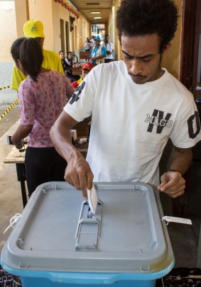 A man casts his vote in East Timor's parliamentary elections on Saturday.