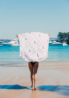 Grab a round beach towel at a reduced price.