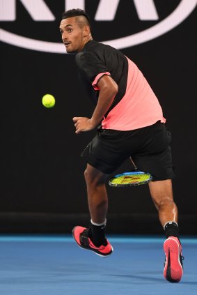 Slick Nick: Kyrgios shows off a new trick during his round two encounter.
