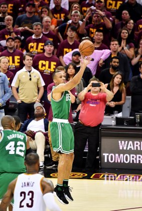 Boston's Avery Bradley shoots the winning basket in their 111 to 108 win over the Cleveland in Game 3.