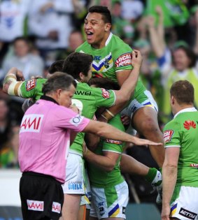 Josh Papalii celebrates a try in the finals win over Cronulla in 2012. 
 