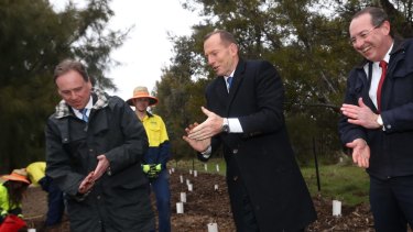 Tony Abbott, Greg Hunt and former MP Peter Hendy at a Green Army project site this year.