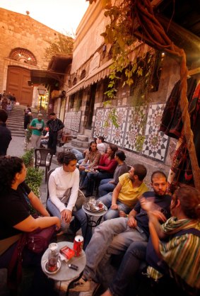 Students gather in a Damascus teahouse.