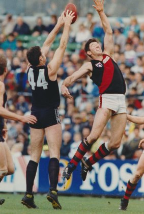 Carlton's Simon Madden attempts to foil brother Justin's mark in the last clash against Essendon at Princes Park in 1992. 