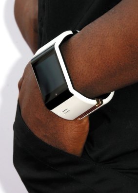 Will-i-am models the Puls smartwatch