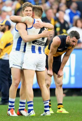 Roos celebrate as Tigers mourn.