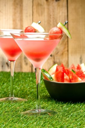 A frozen watermelon daiquiri is bright red and perfect for Christmas.