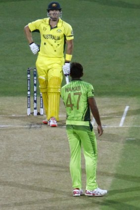 Wahab Riaz has words with Shane Watson during the quarter-final in Adelaide.