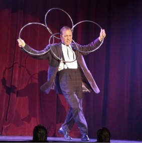 The Eccentric aka Charlie Frye performs with the linking rings as part of The Illusionists: 1903. 