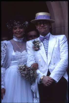 Elton John and Renate Blauel, in the wedding dress designed by Keri Craig-Lee.