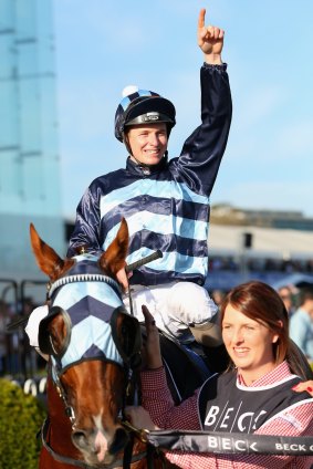 One to go: James McDonald celebrates his million-dollar triumph on Shooting to Win in the Caulfield Guineas.  He could record win number 1000 in the Caulfield Cup.