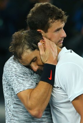 Grigor Dimitrov of Bulgaria congratulates Spain's Rafael Nadal after their gripping semifinal at the Australian Open. 