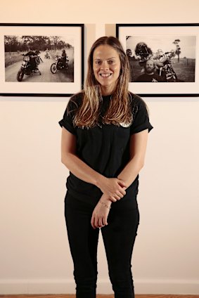 Canberra photographer Stella-Rae Zelnik with her exhibition, Smiles for Miles, at the M16 Artspace. 