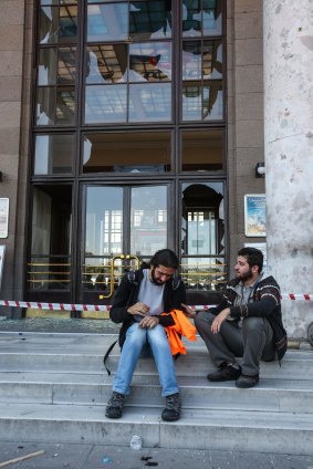 Wounded survivors outside a train station near the blast scene in Ankara.