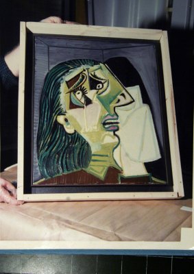 A photo from Neil Holland's examination of the returned Picasso painting Weeping Woman on August 20, 1986.