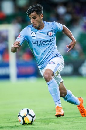 Daniel Arzani of Melbourne City on the ball against Perth Glory.