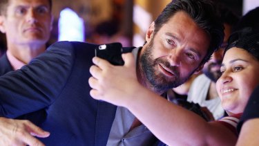 SYDNEY, AUSTRALIA - MARCH 30:  Hugh Jackman poses for a 'selfie' with fans ahead of the Eddie The Eagle screening at Event Cinemas Bondi Junction on March 30, 2016 in Sydney, Australia.  (Photo by Brendon Thorne/Getty Images)