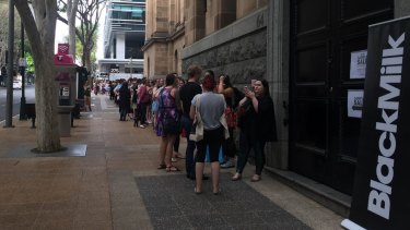 Hundreds Line Brisbane Cbd Street For Local Fashion Brand Black