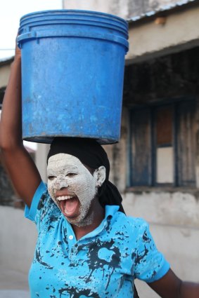 Carrying water on Ibo Island.