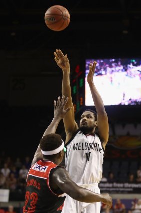 Out in the open: Melbourne United's Ramone Moore sends a shot away.
