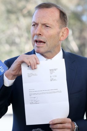 Tony Abbott with his 2015 letter confirming the earlier renunciation of his British citizenship.