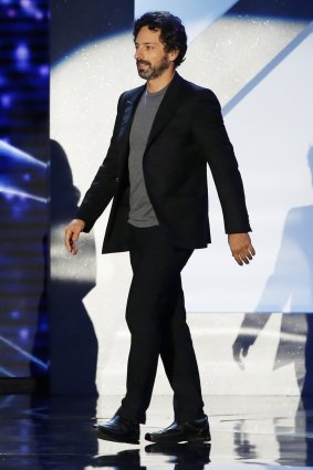 A Glass-less Sergey Brin on stage at the second annual Breakthrough Prize Awards in California.