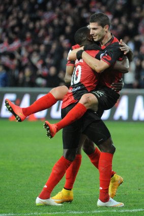 Guingamp's Jeremy Pied (right) celebrates after scoring against PSG.