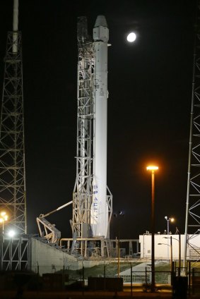 The SpaceX Falcon 9 rocket and Dragon spacecraft stands ready for launch at the Cape Canaveral Air Force Station in Florida.