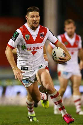 The Dragons' Gareth Widdop runs the ball in the 12-8 loss.