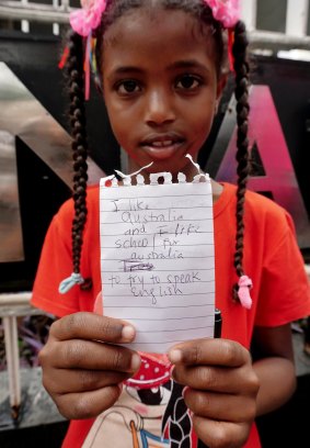 Samar, 8, an asylum seeker from Sudan at the protest outside the UNHCR in Jakarta on Monday.