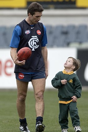Jack Silvagni with dad Stephen in 2001. The younger Silvagni is a father-son prospect for the Blues.