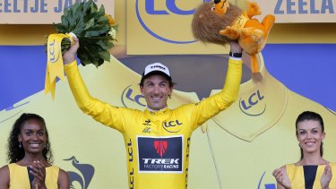 Fabian Cancellara takes the yellow jersey from Rohan Dennis.