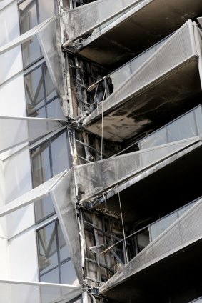 Fire-affected balconies are badly damaged.  