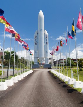 A model of the Ariane 5 space rocket and at the Guiana Space Centre.