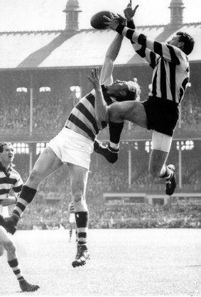 Mick Twomey takes a mark against Geelong in the 1953 grand final.