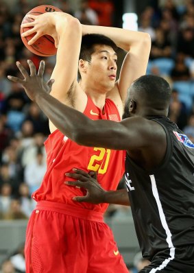 Pass mark: Junfei Ren of China looks for an opening.