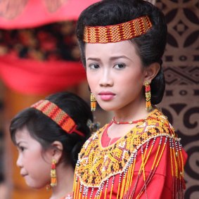 A young Torajan girl during a funeral ceremony indonesia.