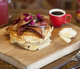 Tasty take: Organic spelt pancakes are topped with candied bacon.