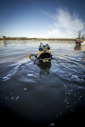 Specialist divers were hired to lay the new high and low voltage cabling on the lake bed of Lake Burley Griffin for the Captain Cook Memorial Jet upgrade works.