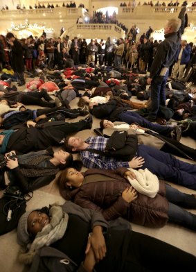 Protesters stage a "die-in" at New York's Grand Central Station after the Garner decision was announced.