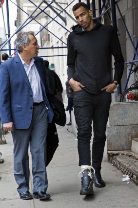 Arrested: Atlanta Hawks player Thabo Sefolosha leaves a courthouse in New York after being released on charges of blocking police officers from setting up a crime scene following the stabbing of Indiana Pacers forward Chris Copeland. 