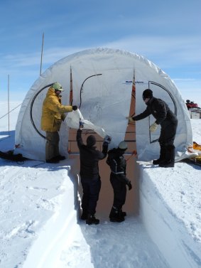Erecting a drilling tent at Aurora Basin North.