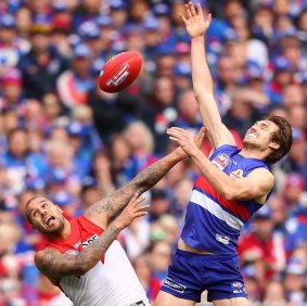 Nemesis: Swans forward Lance Franklin was dominated by Bulldogs back Joel Hamling in the 2016 grand final.