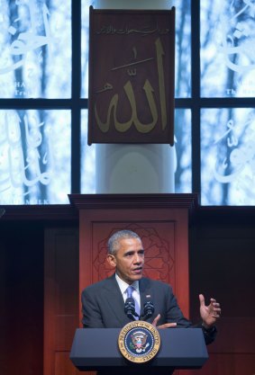 Barack Obama, under a sign that reads "Allah", speaks to the Muslim-American community at the Islamic Society of Baltimore on Wednesday.
